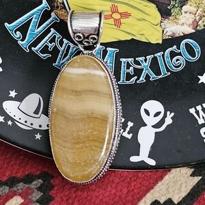 Yellow Agate 2.5" Pendant helps you feel safe in the world